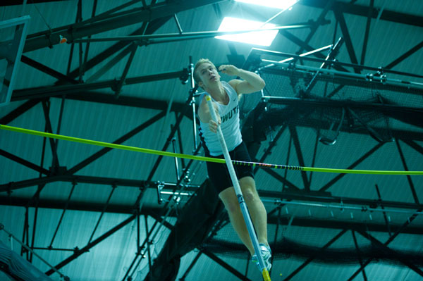 Dan LaRocca ‘13 soars in the pole vault within the Shirk Center’s indoor track.