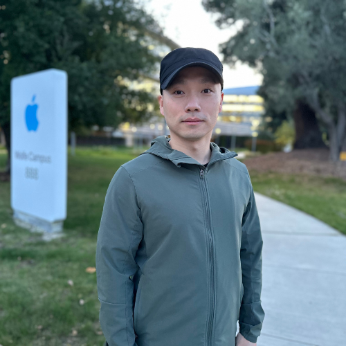 Ding Qing Ding standing in front of Apple Headquarters