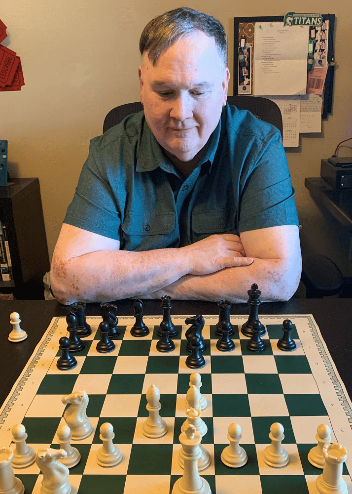 Robert Irons Robert Irons ponders over a chess board