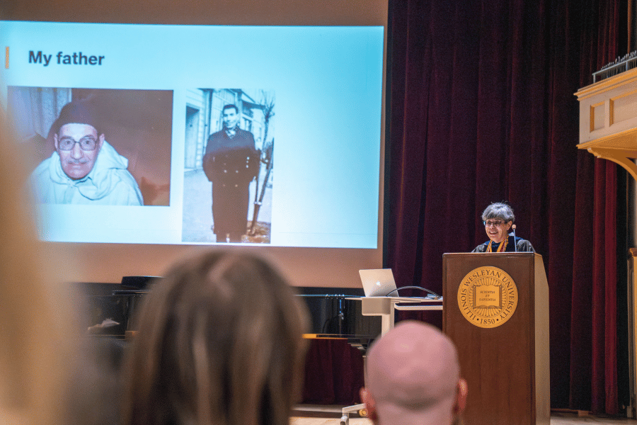 Math Professor Zahia Drici speaks at podium during the 2025 Kemp Awards at IWU