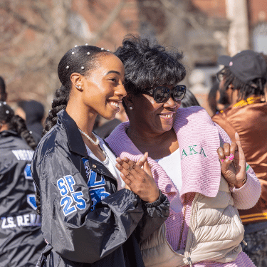 New IWU member of Zeta Phi Beta Sorority poses at chartering ceremony