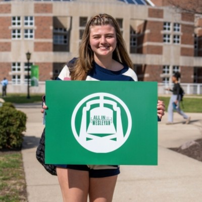 Student with All In sign