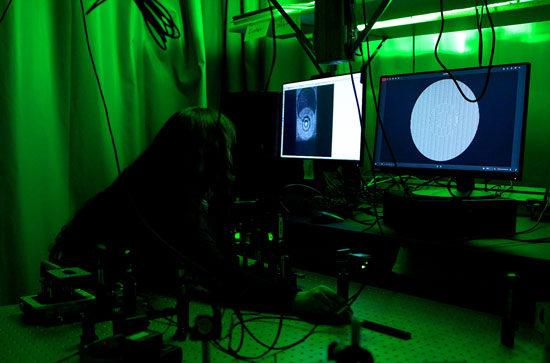 Wanda in a quantum lab, green lighting