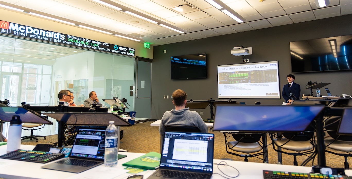 Student presenting in a Business class.