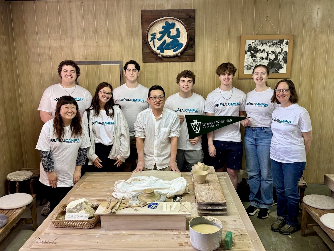 Class photo at Japanese craftsman's pottery studio.